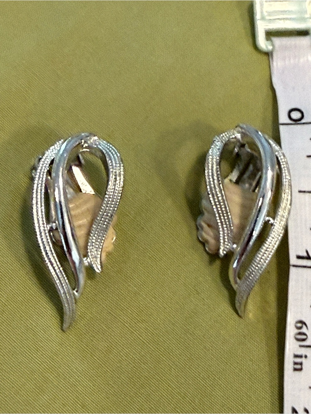 Sara Coventry vintage earrings avant garde silver tone swirl design